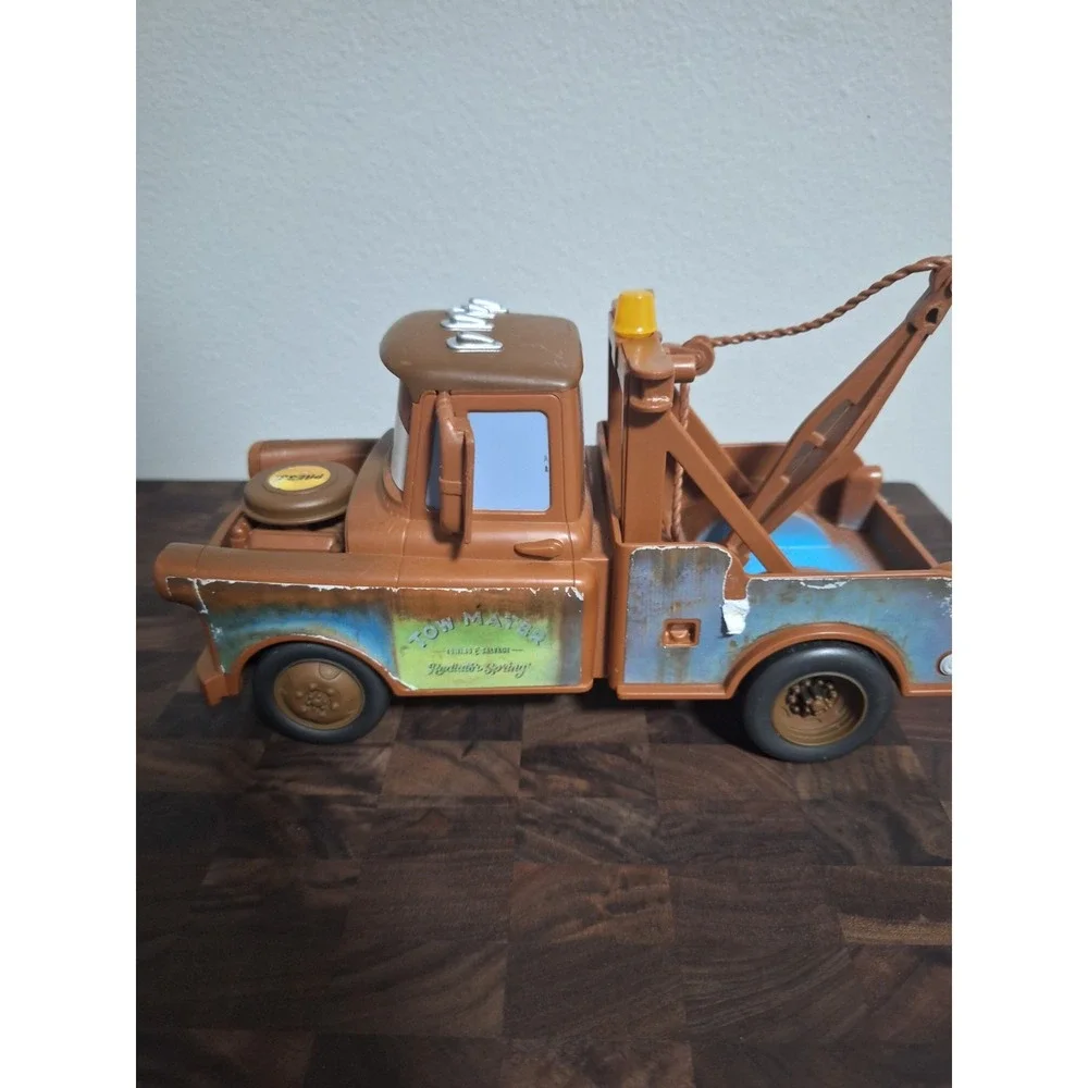 Disney Pixar Cars Light Up Tow Mater Tow Truck Engine Press Sound Toy